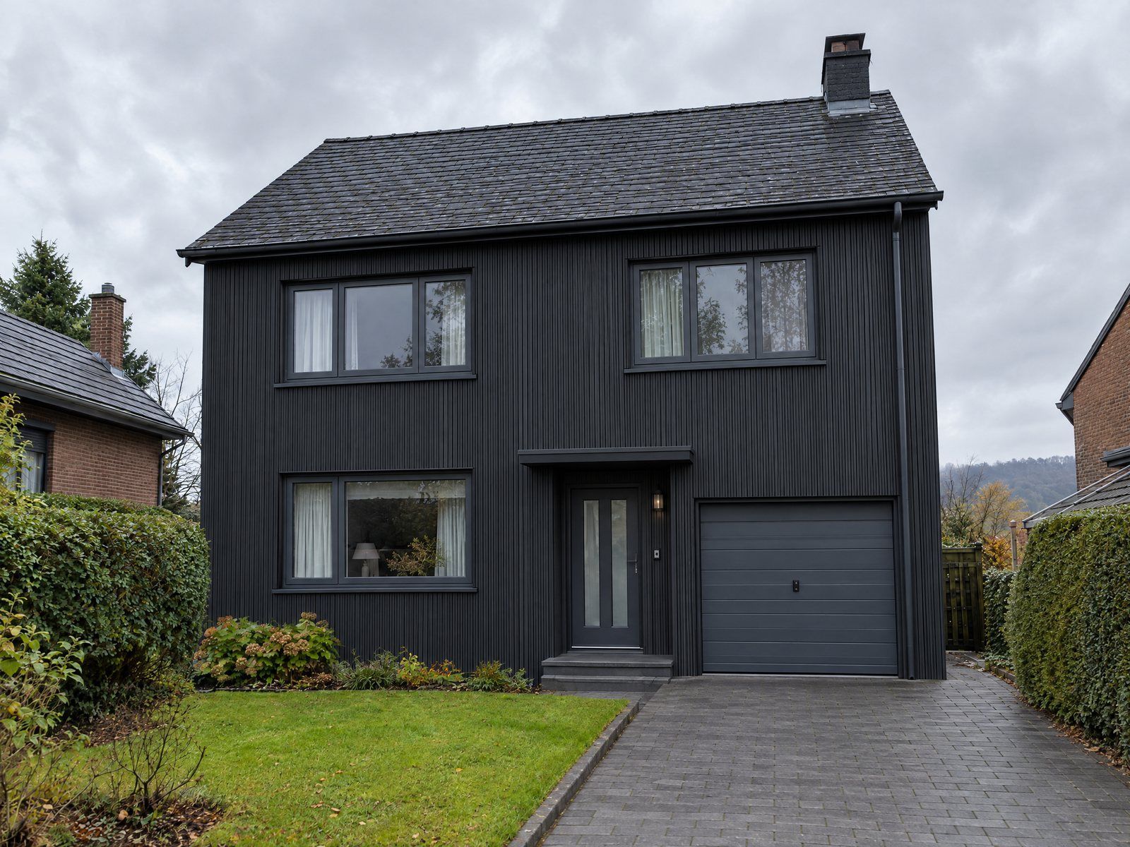 La même maison habillée de bardage Evodek Black