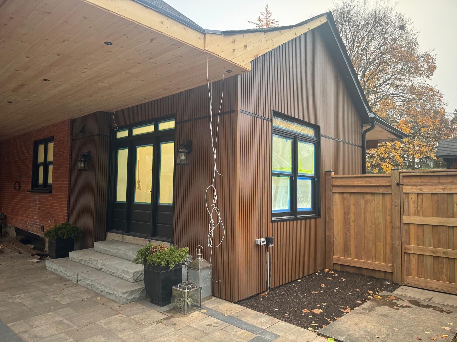 Terrasse couverte en bardage Oak